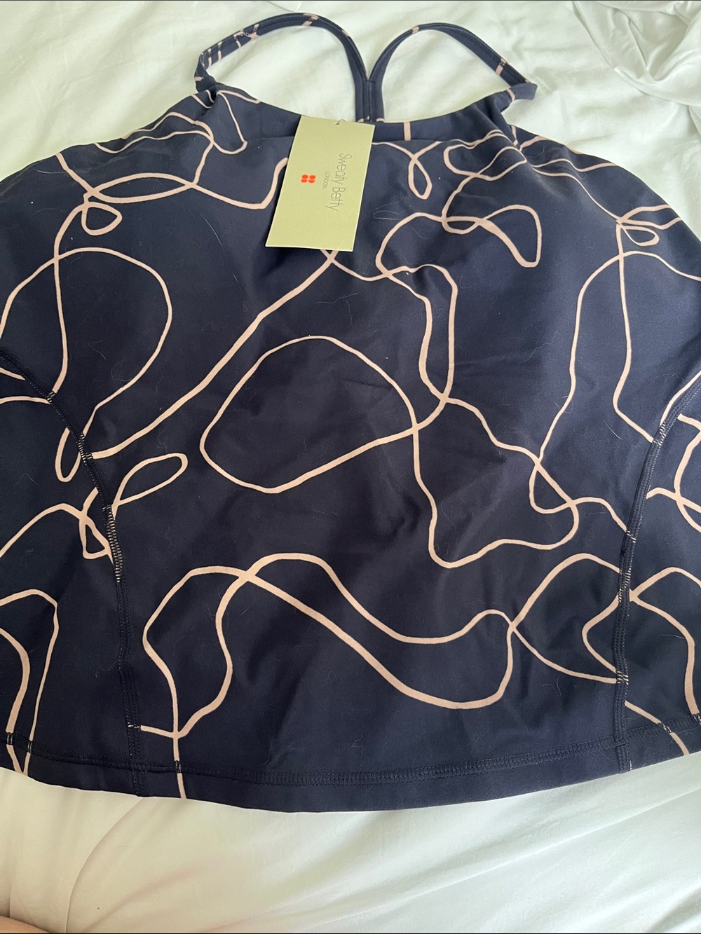NWT Sweaty Betty Navy Top with Blush Pink Abstract Lines